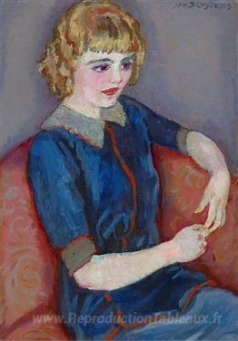 Fille à un canapé rouge