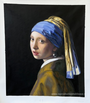 La fille avec une boucle d'oreille perle